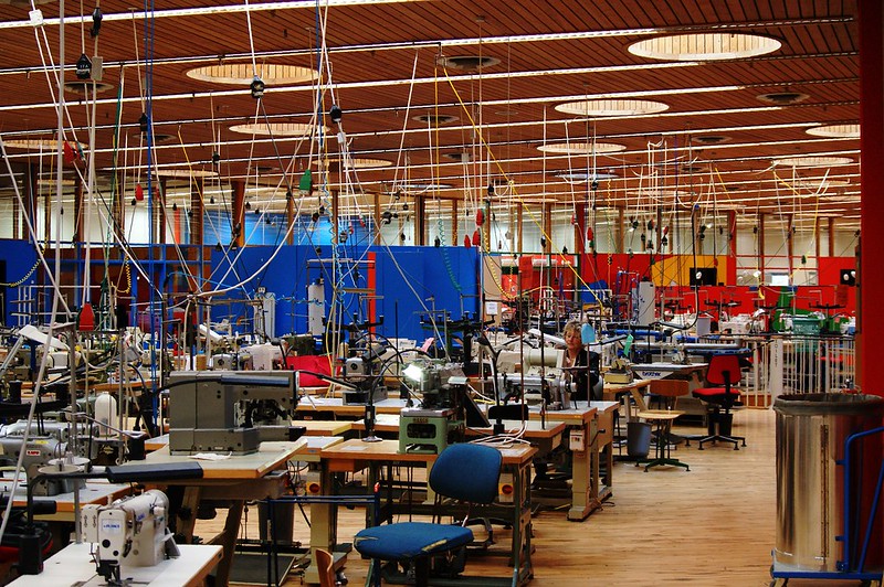 Give four reasons why Kenya should become an industrialized country