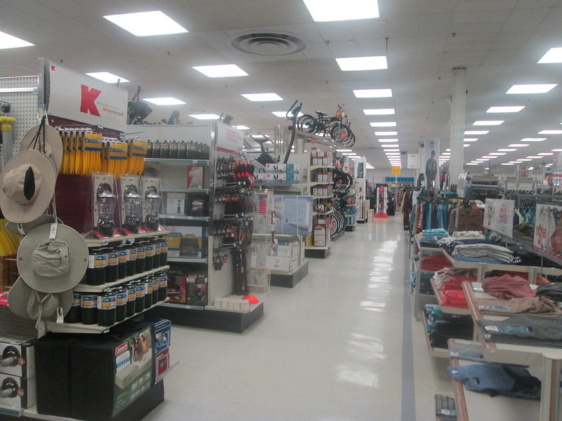 Explain five differences between chain stores and departmental stores